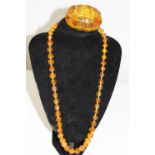 A amber bakelite chunky bracelet & necklace