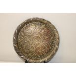 A large white metal & brass tray 42cm in diameter