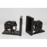 A pair of quality carved ebony elephant bookends (missing one tusk)