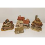 Four David Winter cottage models