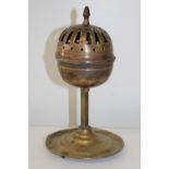 An Islamic brass incense burner