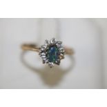 A 9ct gold opal & white stone ring size S