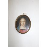 A 19th Century Italian portrait on ivory panel signed with inscription to the reverse 7cm