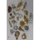 A large collection of vintage brooches