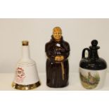 Three collectable ceramic decanters