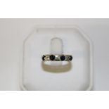 A 9ct gold diamond & sapphire ring size N