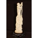 An antique hand carved ivory Immortal figure, signed to the base H 18cm without stand