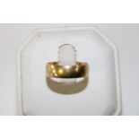 A 18ct gold band ring 4.7 grams size N 1/2