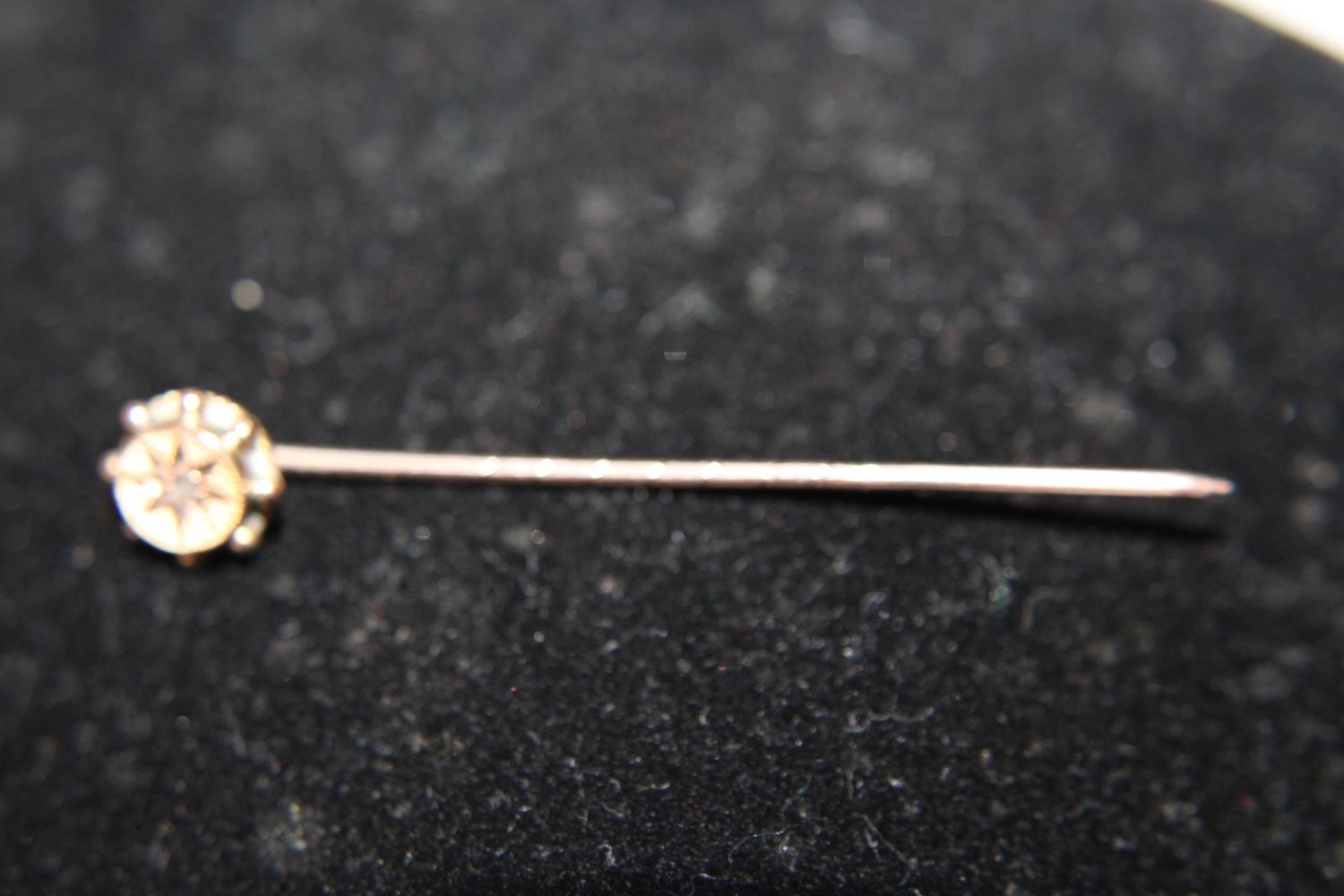 A 9ct gold stick pin 1 gram