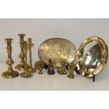 A good selection of assorted vintage brass ware