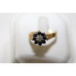 A 18ct gold sapphire & diamond cluster ring 5.1 grams (for scrap)