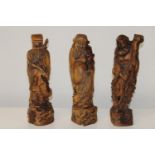 Three 19th Century hand carved wooden Chinese elders 30cm tall