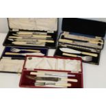 A large selection of vintage cased cutlery