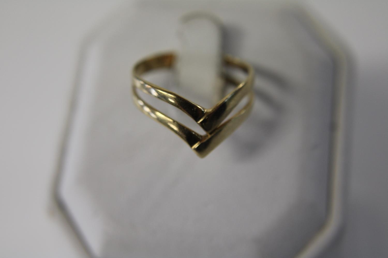 A 14ct gold ring (broken) 2.1 grams