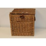 A large wicker work picnic basket 48cm x 47cm x 47cm