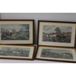 A set of four framed hunting scene prints