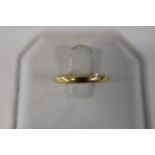 A 22ct gold band ring 2.6 grams