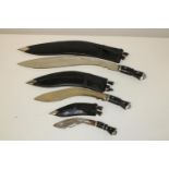 A set of three vintage Kukri knives in leather scabbards, with lions head motive & associated