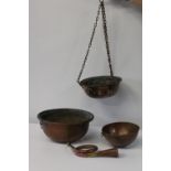 A selection of copper hanging baskets & other items