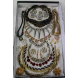 A selection of assorted vintage costume jewellery