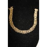 A 9ct gold gate bracelet 12.2 grams
