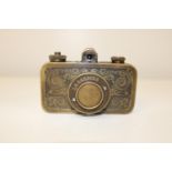 A vintage La Sardina camera in a brass bound case