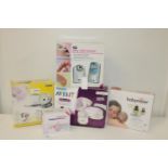 A selection of boxed baby related items