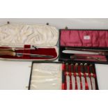 Three boxed sets of vintage horn handled cutlery