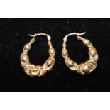 A pair of 9ct gold hoop earrings 1.8 grams