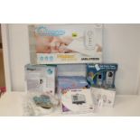 A job lot of boxed baby related items