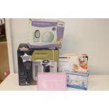 A selection of boxed baby related items