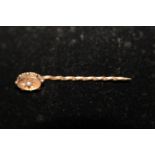 A 9ct gold & pearl stick pin 1.1 grams
