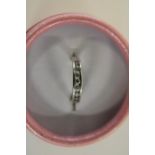 A 9ct white gold channel set half eternity ring size M 1/2