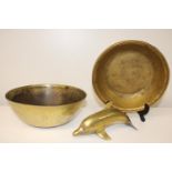 Two brass bowls & a brass dolphin
