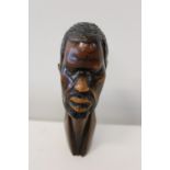 A hand carved wooden African bust h22cm