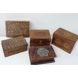 A collection of brass inlaid boxes etc