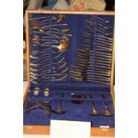 A vintage bronze boxed cutlery set
