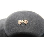 A pair of 9ct rose gold earrings