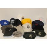 A box of baseball caps & other