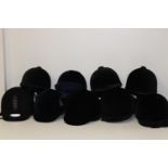 A box of horse riding hats