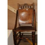 A early 20th century beech framed rocking chair (As found) Collection only