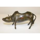 A Chinese bronze censor in the form of a cow (sold as seen) 15cm long