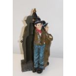 A vintage Laurel & Hardy ceramic wine bottle holder (sold as seen) h43cm