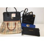 A selection of Ladies hand bags & purses (sold as seen)