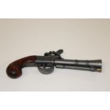 A replica flintlock pistol