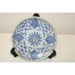 A 18th century Chinese blue glazed plate with character marks to base (sold as seen) dia 19cm