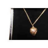 A 9ct gold chain & heart pendant