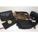 A selection of Ladies hand bags & purses (sold as seen)