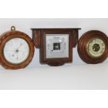 A selection of three wooden case barometers (sold as seen)