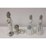 Four Spanish pottery figurines tallest 27cm